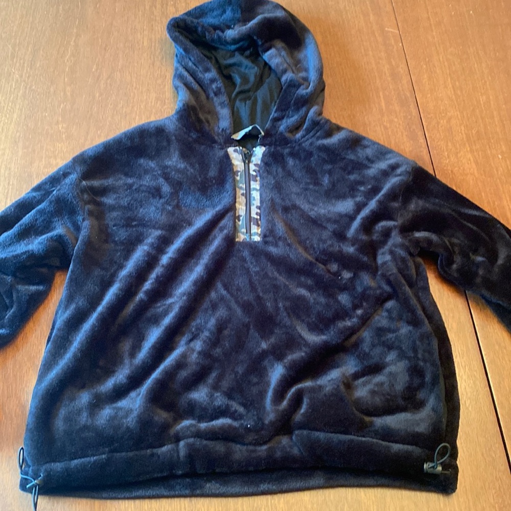 Black hoodie with camouflage zipper from Anthropologie